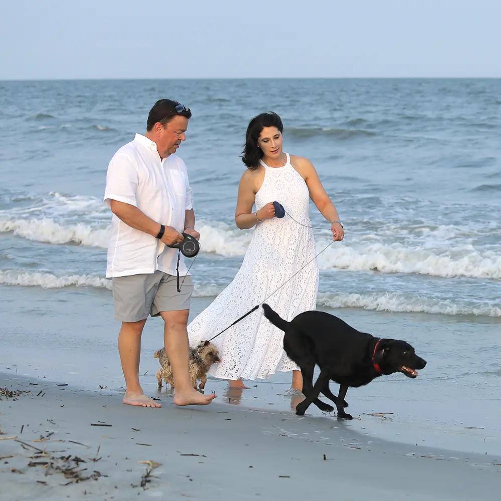 Dr. Couzens with her husband and dogs